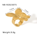 Detailed view of dual butterfly gold ring with hammered texture and adjustable open band - Double Overlapping Butterfly Style (NB-R2023075)
