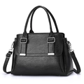 Chic black textured crossbody bag with silver hardware and dual handles on white background - Black