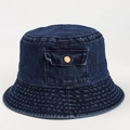 Detail of vintage blue denim bucket hat featuring a side pocket with bronze metal button - M (56-58cm) / Dark Blue