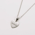 Macro shot of silver stainless steel heart pendant with Soulmate laser engraving - Steel Color (Soulmate)