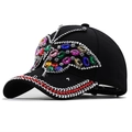 Women's black cotton baseball cap with large colorful rhinestone butterfly embellishment - Black