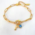 14K vergulde roestvrijstalen paperclip armband met blauwe steen en letter F bedel - Letter R / Staalkleur
