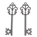 Vintage alloy key pendants in dark metal gray finish with intricate hollow patterns - Gun Black