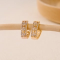 Macro shot of V-shaped gold hoop earrings with zircon stones and hollow floral patterns - EH410022-Gold Full Zirconia Hoop