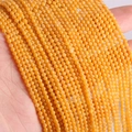 Strands of 2mm to 3mm natural orange tiger eye round beads for jewelry making - Topaz