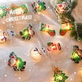 Guirnalda de luces LED de Navidad con Papá Noel y muñeco de nieve sobre fondo de tela blanca - Estilo A