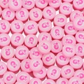 Pink ribbon polymer clay beads for handmade jewelry making and DIY awareness crafts - Pink