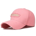 Pink cotton baseball cap with Thinking embroidery and distressed frayed hole details - Pink