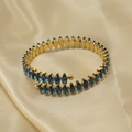Adjustable gold stainless steel bangle with marquise-cut deep blue gemstones - Blue