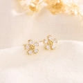Elegant S925 gold-plated floral earrings with zircon crystals on soft linen fabric - Gold