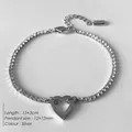 Silver stainless steel tennis chain bracelet with a hollow heart pendant and 15+3cm length - Hollow Heart Pendant Tennis Chain (XBL0037-1)