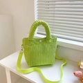 Neon green corduroy bucket bag with spiral handle and adjustable crossbody strap - Light Green