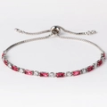 Detail of silver tennis bracelet featuring red rectangular zircons and adjustable slider - Rose Red Zircon White Gold