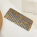 Retro acetate hair comb with classic tortoiseshell pattern and wide tooth design - Tortoise
