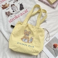 Close-up of cute bear and dog embroidery on yellow canvas drawstring tote bag - Parent-Child Bear (Yellow)