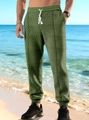 Pantaloni joggers uomo verde erba in tessuto jacquard a rombi con coulisse bianca - S / Verde Militare