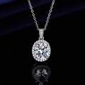 Silver necklace with oval cut gemstone pendant and halo diamond setting on black background - Oval Zircon Necklace Xl-88