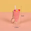 Pink ice cream sundae keychain with stars and fruits for backpacks 6cm high - Pink