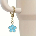 Gold chain tumbler accessory with blue flower charm on a white ceramic mug handle - Blue