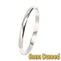 Macro shot of 6mm domed silver metal bangle featuring a high-polish mirror finish - Simple Domed Surface (Silver) / 6mm Width