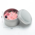 Pink soy wax scented candle in a 6cm silver tin with dried herbs and crystal stones - Pink