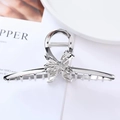 Elegant silver metallic butterfly hair claw clip with a glossy polished alloy finish - 3D Bow / Large / Silver