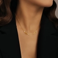 Close-up of a gold necklace featuring geometric hollow links and white pearls on a model - Gold Geometric-Hollow Links with Pearls
