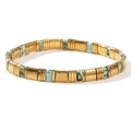 Elastic Tila bead bracelet featuring a mix of gold metal and light blue turquoise tiles - Light Blue