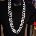 Chunky silver hip hop Cuban chain necklace displayed on a black neck mannequin - 100cm Length / Silver