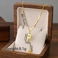 Titanium steel necklace with gold letter P pendant and long tassel drop on jewelry box - Letter P / Gold