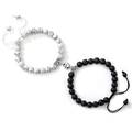 Detail of couple magnetic heart bracelets with white stone and black matte beads - White Turquoise and Matte Stone