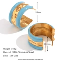 Macro shot of 18K gold-plated C-shaped hoop earrings with light blue enamel wave pattern - Gold & Light Blue - Earrings