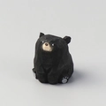 Handcrafted minimalist black wooden bear figurine with geometric multi-faceted carving - Black Wood Carved Bear