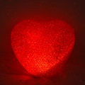 Red heart-shaped night light with granular texture emitting warm red glowing light - 14cm / Red