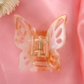 Macro shot of marble textured pink butterfly hair claw clip on soft silk fabric - 17# Pink Orange Marble Cutout Butterfly Claw Clip