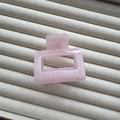 Macro shot of pink marble texture on a rectangular hollow hair claw clip with glossy finish - Pink Small Square 5cm