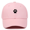 Detailed view of pink cotton baseball cap featuring black paw embroidery and curved brim - Adjustable / Pink