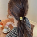 Elegant black hair claw clip with gold buckle on a high ponytail for women - Black Claw Clip