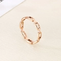 Macro shot of minimalist rose gold hollow chain link ring showing fine metal texture - US 6 / Rose Gold