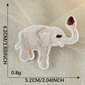 Cartoon elephant embroidered patch in white and pink, iron on decal for clothes 5.2x4.2cm - White Elephant