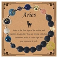 Detail of Aries constellation bracelet with lava stones and blue beads on display card - Aries