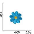 Detail of blue daisy embroidered patch with yellow center and 4cm measurement scale - No.33 Sky Blue Small Flower