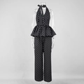 Close-up of black and white polka dot halter top with peplum hem and bow detail - S / Black