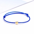 Adjustable blue woven rope lucky heart bracelet with a small gold-tone charm pendant - Blue/Gold
