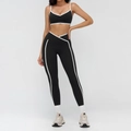 Black yoga set with white contrast trim featuring V-waist leggings and sports bra - S / V-Neck Strappy Bra & Leggings Set / Premium Black