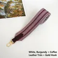 Detail of woven geometric strap in white and burgundy with leather and gold hook - White Wine Red with Coffee Trim