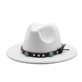 Close-up of a white felt fedora featuring a turquoise and silver studded leather band - M (56-58cm) / White