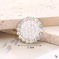 Detailed macro view of a 2.5cm pearl and crystal rhinestone shoe charm decoration - Rhinestone Circle Pearl Flower Silver