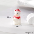Macro view of flocked snowman charm with red hat, scarf and dimensional measurements - Snowman