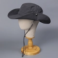 Detail of dark grey sun hat featuring adjustable wind cord and breathable side vents - Gray